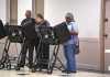 Lester Bowie and Miriam Tlali using electronic voting machines at a polling place