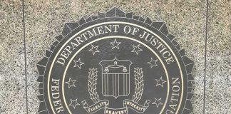 FBI seal on a granite wall