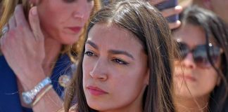 Protesters Heckle AOC Amid News Conference