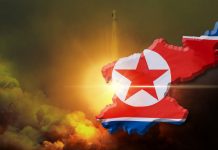 North Korea map with flag over rocket launch background