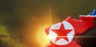 North Korea map with flag over rocket launch background
