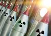 Line of nuclear missiles with radiation hazard signs