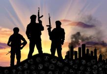 Silhouetted soldiers with rifles at sunset city background