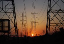 Transmission towers at sunset