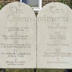 Stone tablet with the Ten Commandments engraved.