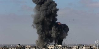 Large explosion over a crowded urban area