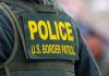 Police US Border Patrol uniform vest closeup