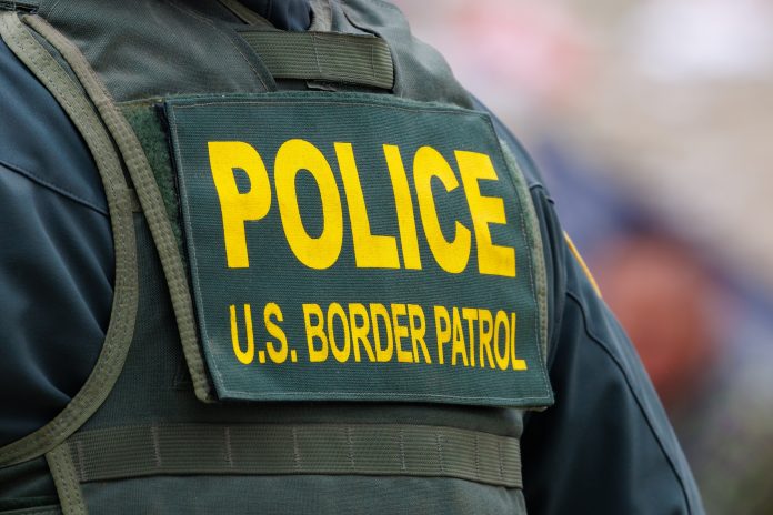 2331437679 featured image Police US Border Patrol uniform vest closeup