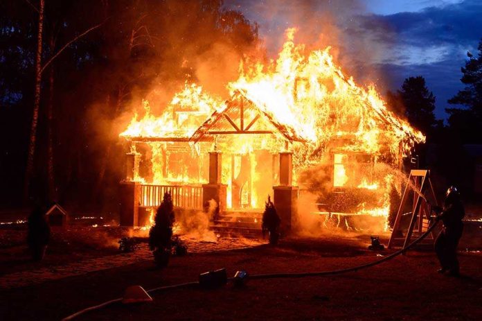 569622439 featured image House engulfed in flames with firefighters present
