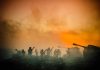 Soldiers and tanks in the foggy battlefield