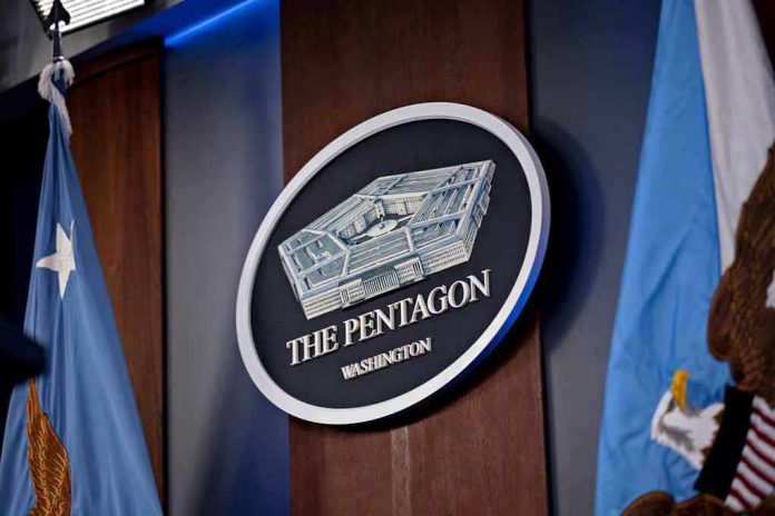 2265798341 The Pentagon emblem between two flags