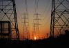 Transmission towers at sunset
