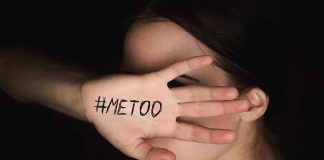 Hand with "#MeToo" covering face.