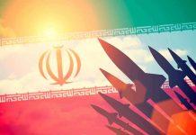 Silhouettes of missiles over Irans flag graphic