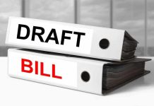 Two binders labeled Draft and Bill.