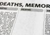 Newspaper obituary section with death notices.