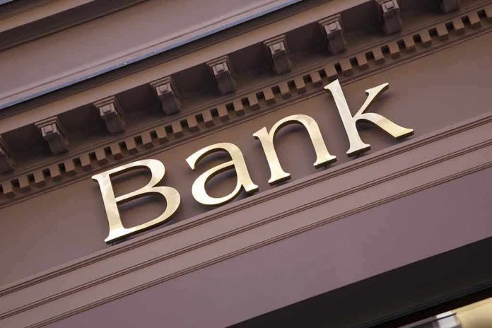 240120346 Gold bank sign on building facade